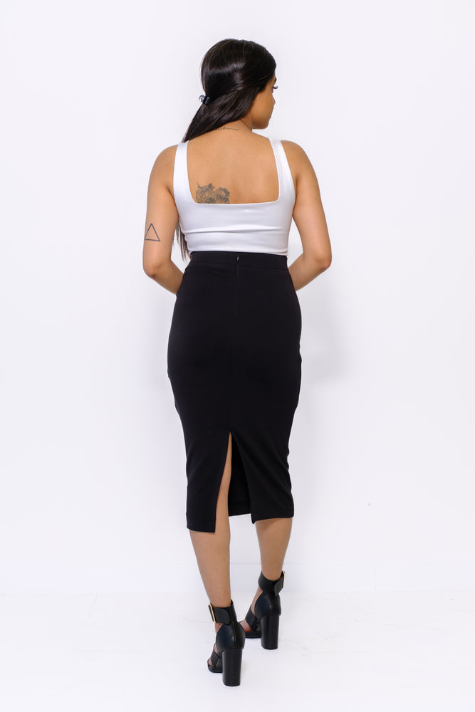 
                  
                    Midi skirt with a bodycon fit, high waist and back slit
                  
                