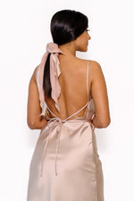 Scarf with a triangle cut for extremely versatile styling, from crop top to hair scarf to bag accessory
